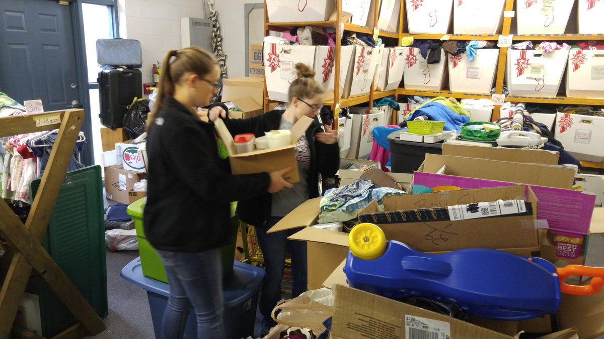 StudentMerge's tweet image. Organizing dontated goods at Montgomery Village