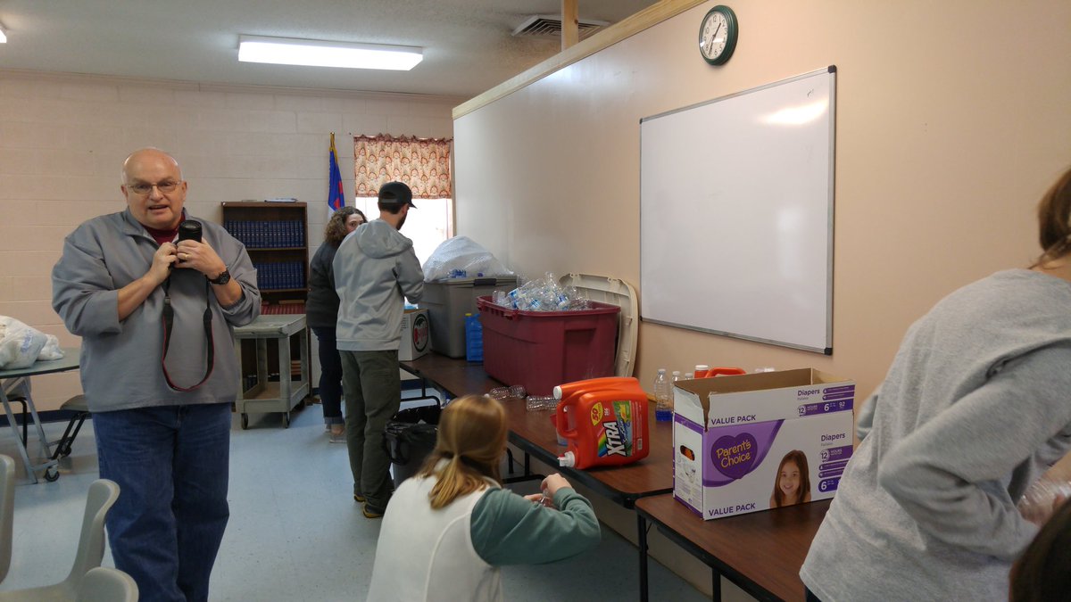 StudentMerge's tweet image. Preparing household items to give out at Montgomery Village. (also caught a pic of the @BDBCstudents photographer)