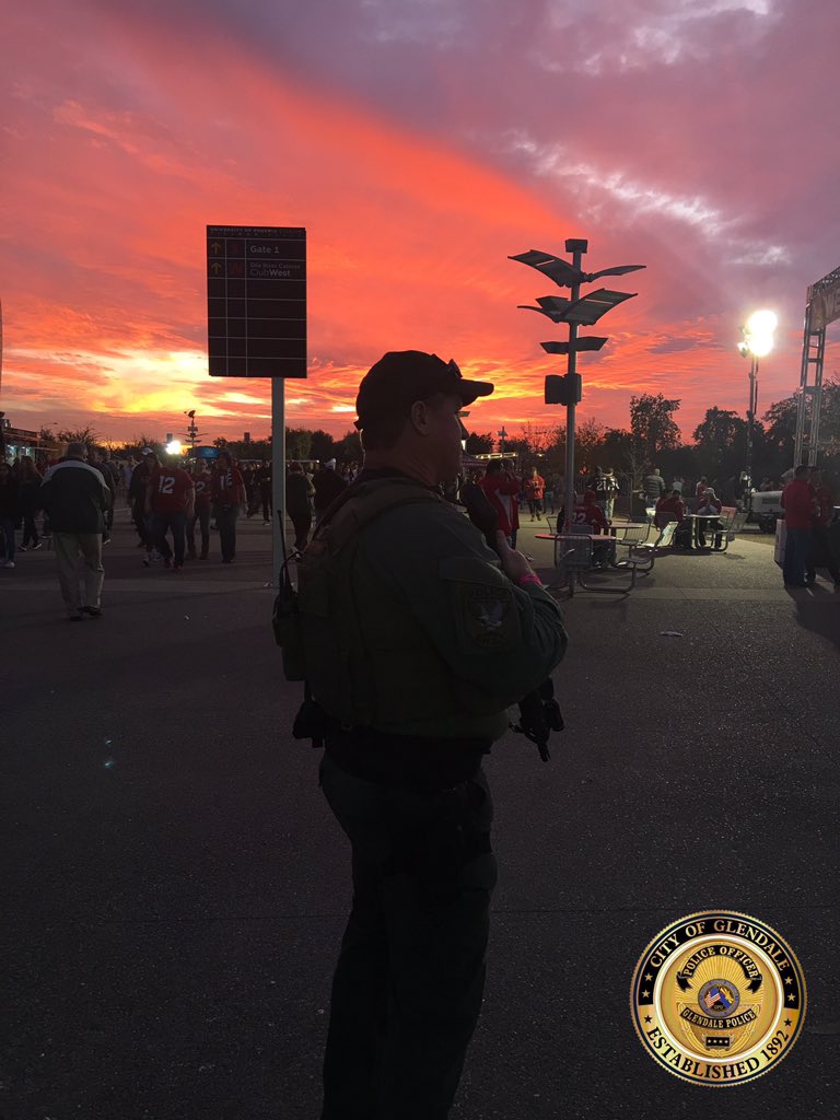 As the sun sets and kickoff nears, the men & women of GPD continue to stand guard. #GBvsAZ #ServingProudly #sunset