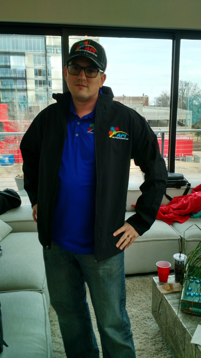 arcpyro's tweet photo. Sam showing off some new #API gear. Think he's got enough on? #arcpyro #merch #TooManyLogos https://t.co/60yMNk2s83