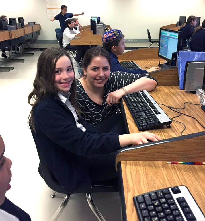 Payworks's tweet image. Lauren, a @PayworksInc's #SystemsDeveloper, used her #PayItForwardDay to teach kids #code: ow.ly/X7TKx