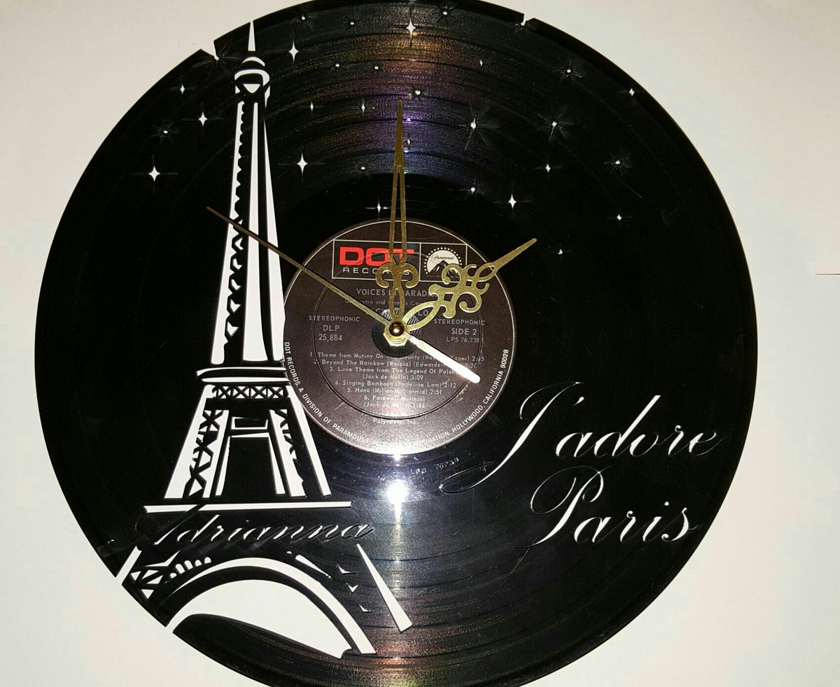 CollectiveMaker's tweet image. Eiffel Tower Upcycled Vinyl Record Clock.