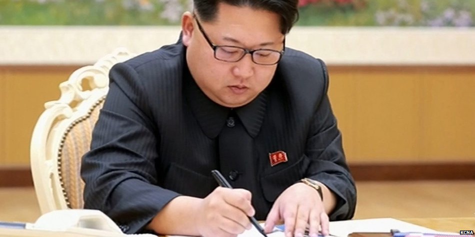 BBCNewsAsia's tweet photo. N Korean state media releases photo of Kim Jong-un "signing" order for hydrogen bomb test https://t.co/ayorpKXJxv https://t.co/Gg6KpmgE1P