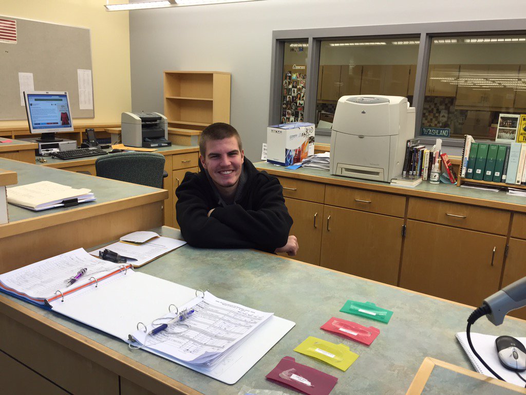 MarybethGallant's tweet photo. He's back...and now they're paying him to do this! #alumniemployee #libraryregular https://t.co/PUVTN02BMO