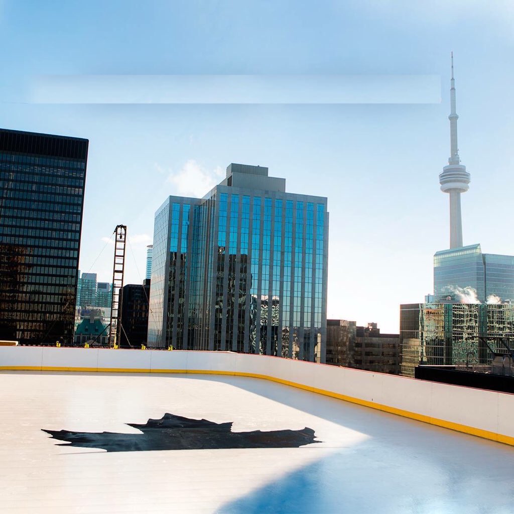 Rooftop rink downtown Toronto.. Only in Canada.