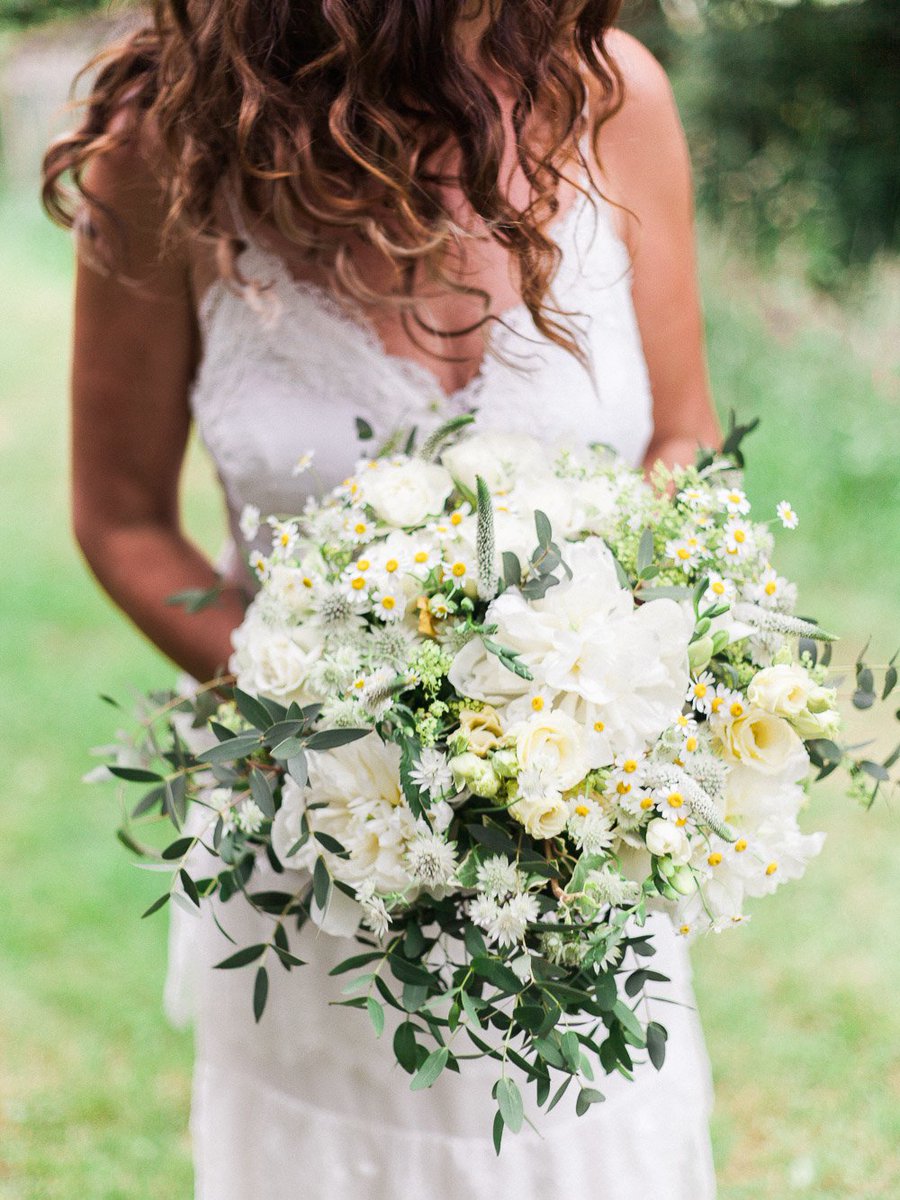 We're totally smitten with the big bloomsy bouquets on todays country #wedding rockmywedding.co.uk/caroline-tony/