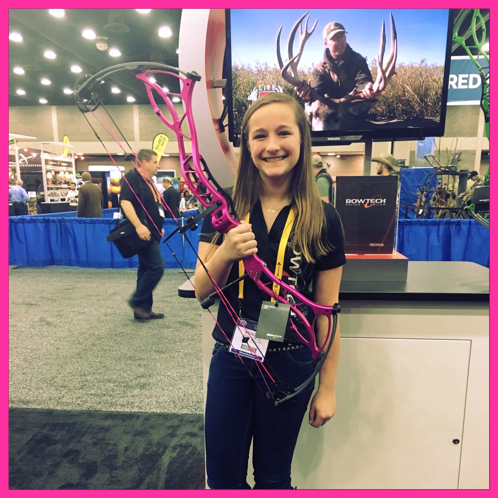 Pro staffer Reagan Bryan getting a feel for the new #Bowtech Fanatic 2.0 and getting photobombed by @C_KROBBINS