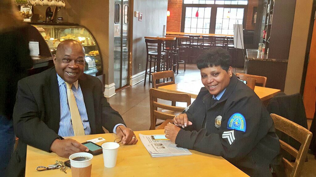 SLMPD's tweet photo. #CoffeeWithACopSLMPD at @cafeventana is filled with residents meeting their local officers &amp; enjoying coffee! https://t.co/j2WuWPTcIn