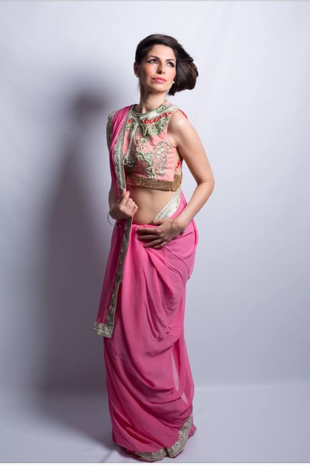 Pretty elegant pink Saree with mirror work border and stunning embellished blouse with pearls and beads:)