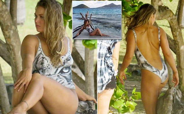 PICTURED: Ronda Rousey wearing nothing but body paint during her Sports Ill...