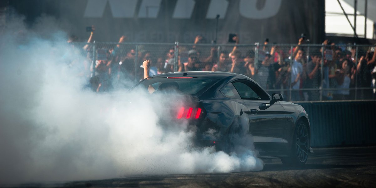 NittoTire's tweet photo. #TBT with @VaughnGittinJr. sneak peeking the #NT555G2 to the enthusiasts at the CA #AED2015. #NittoTire #NT555G2 https://t.co/I9w4eDCPQW