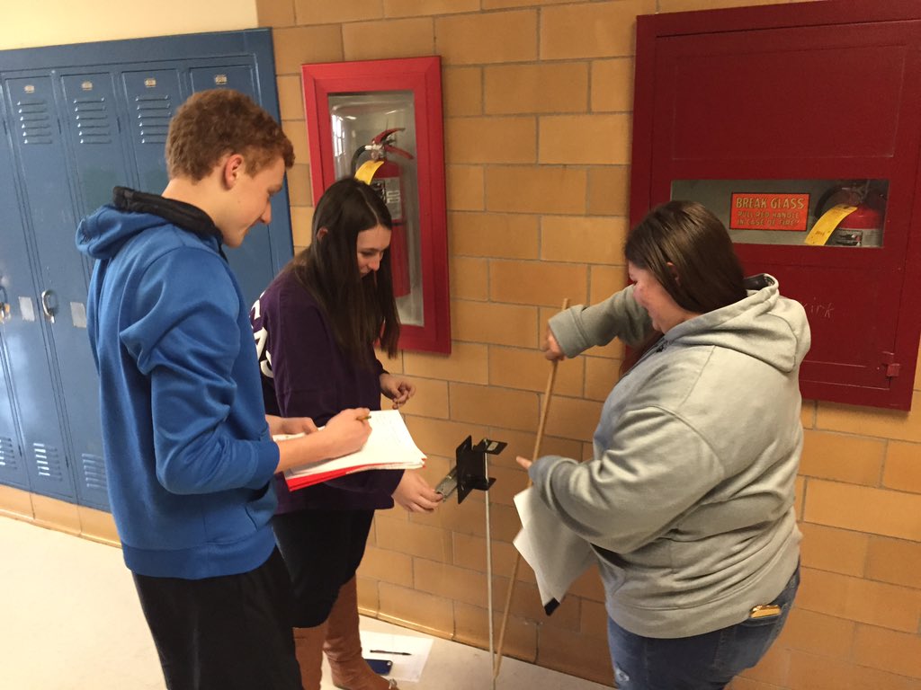 Physics students today doing a #projectilemotion lab in the halls, where v(fx)=v(ix)+a(x)•t. #solveit