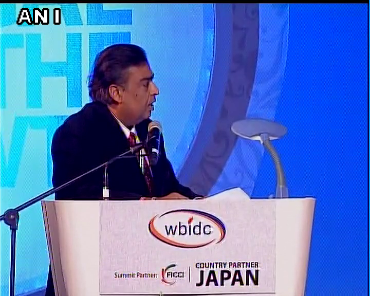 ANI's tweet photo. Mukesh Ambani speaking at the Bengal Global Business Summit in Kolkata. https://t.co/Wsc4MiRVUA