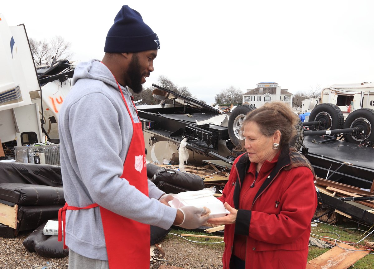 dallascowboys's tweet photo. .@dmcfadden20 provided a meal &amp; a hug to a woman impacted by the Dec. 26 tornadoes. To help text STORM to 51555 https://t.co/w7QSIZ5vFK
