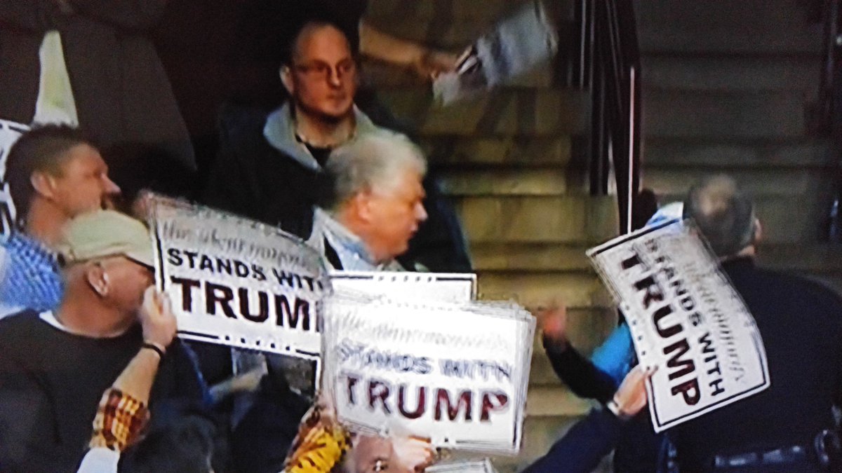 Ougasam's tweet photo. Peaceful #American Muslim woman escorted out of @realDonaldTrump rally. Insultd by trump supporters #GOPHatesMuslims https://t.co/nJGOFgYOmZ