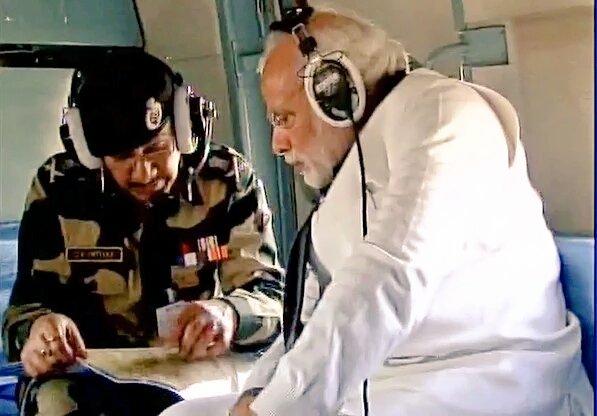 spati2012's tweet photo. PM Modi taking aerial survey in #Pathankot !! #ModiInPathankot https://t.co/nSuy6igSOp