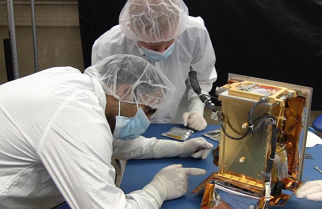 NASA's tweet image. Student-built experiment installed onto OSIRIS-REx spacecraft will travel to astroid Bennu: go.nasa.gov/1TMc4PM