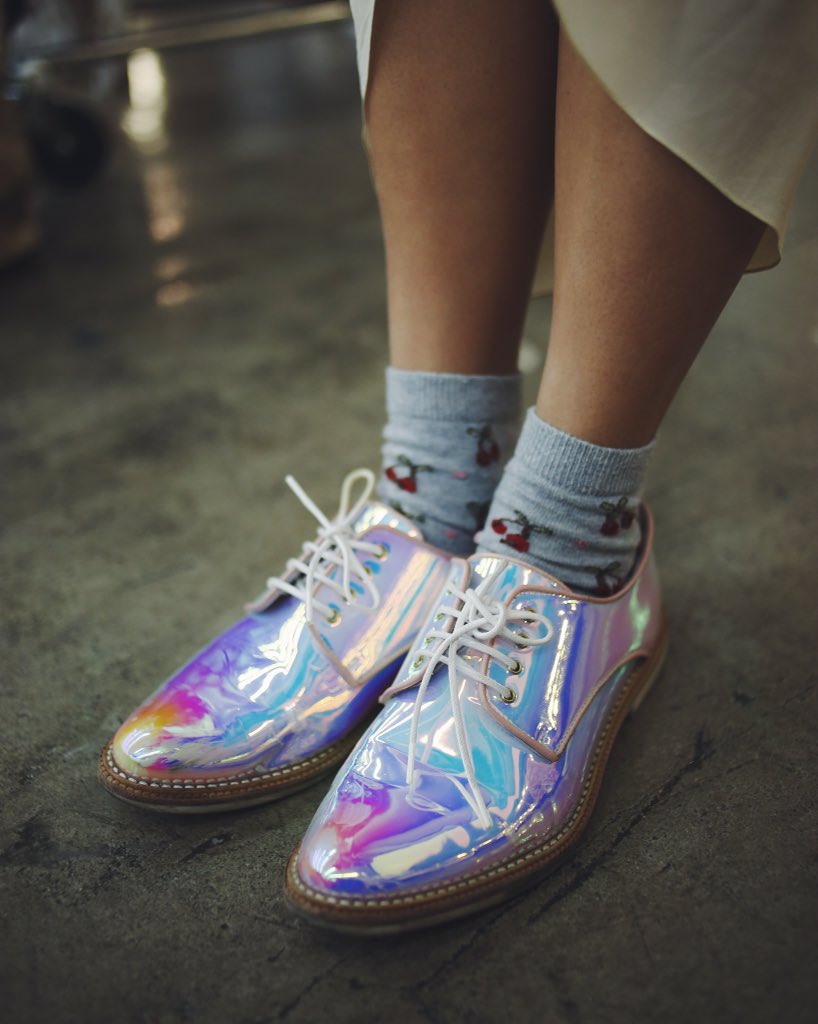 The future is now 🔮 Iridescent oxfords spotted at our holiday show #streetstyle