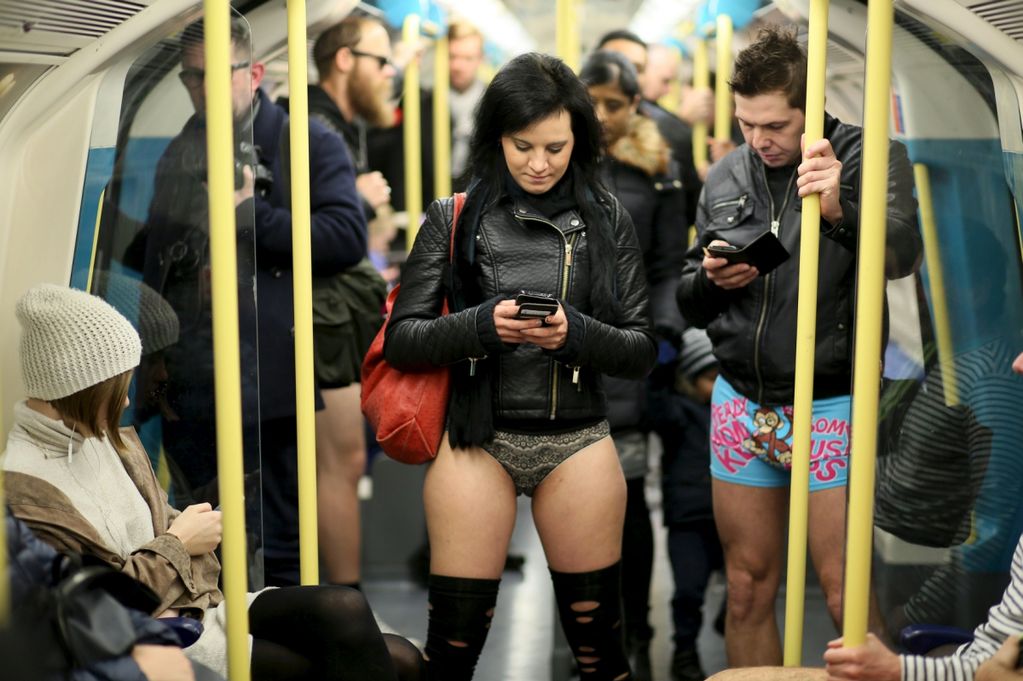 The Mirror on X: No Pants Subway Ride 2016: London commuters strip down to  underwear   / X