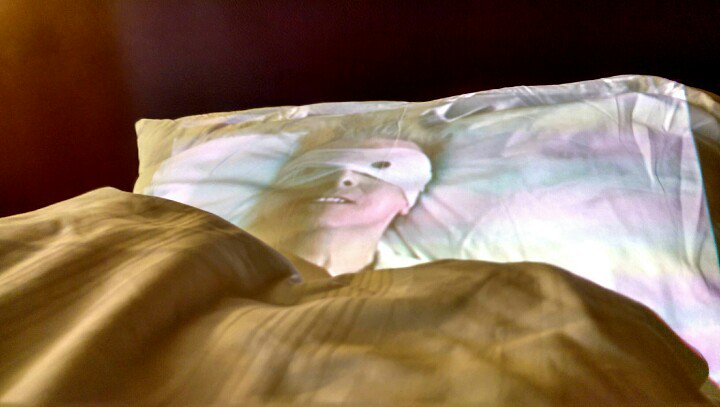 pwlight's tweet photo. I turned the hotel bed into David Bowie laying in state using a pico projector and video mapping #tribute #shrine https://t.co/gGl9y6tS3a