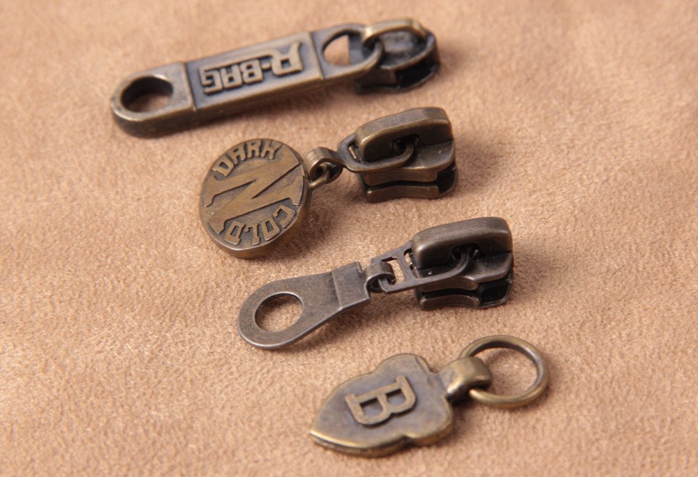 SiniclineE's tweet image. Metal zipper pullers, sliders in different sizes and shapes. View more at goo.gl/6r3HgL. #zipperpuller