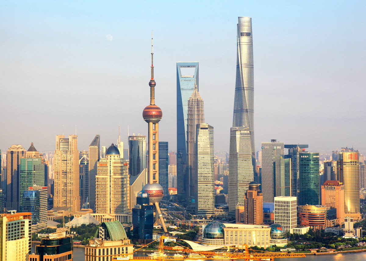 dezeen's tweet photo. World's second-tallest building completed in Shanghai: https://t.co/G47HUAHBCm #architecture https://t.co/DTxyYLJGQd