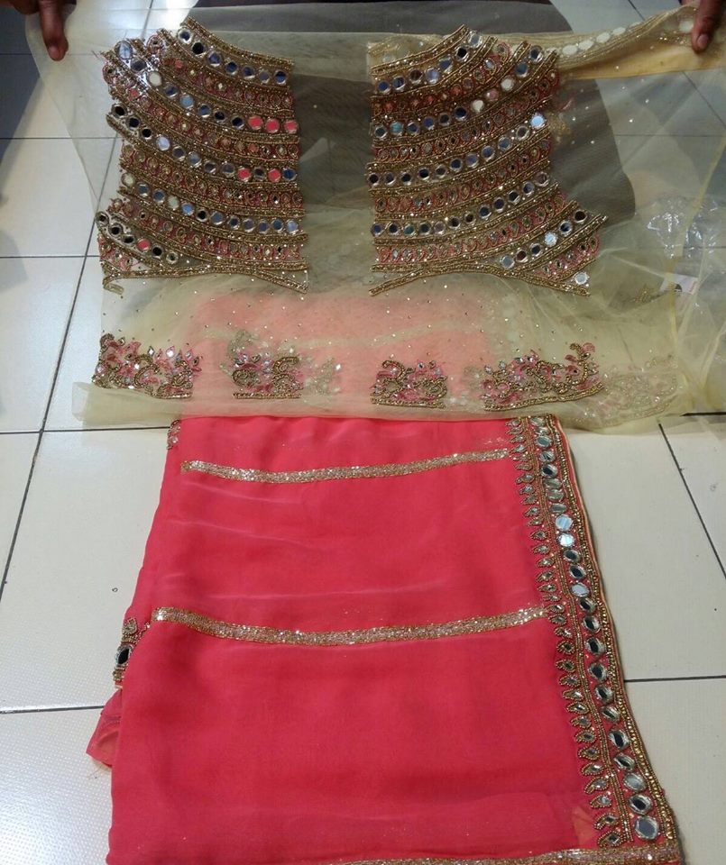 Gorgeous Saree with mirror border and a elegant mirror work blouse piece:)