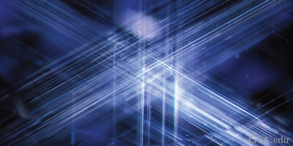 GIAnews's tweet photo. #Sapphire often contains delicate intersecting needles of rutile called silk. https://t.co/zkwBvzQ1kr https://t.co/bBVdzBNj3Y