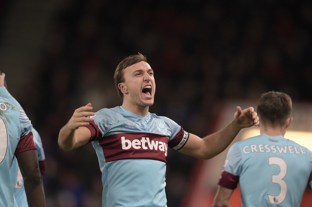 WestHam's tweet image. GET IN THERE! The skipper @Noble16Mark celebrates with the Claret and Blue Army! [1-3] #WHUFC #BOUWHU
