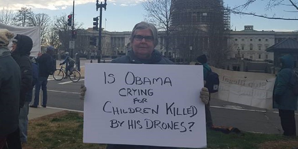 NoDronesWI's tweet image. "Is #Obama crying for children killed by his #drones?" #NOdrones protesters arrested @ #SOTU archive.org/details/RealSt…