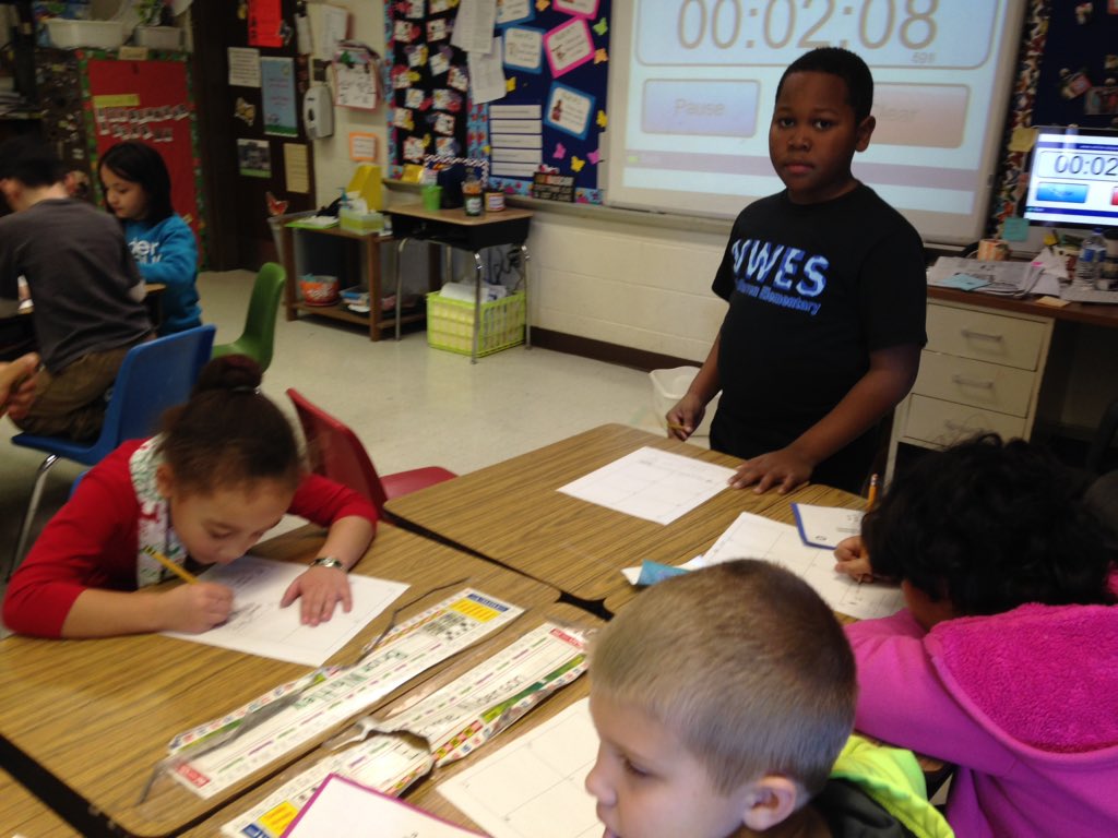 Shelli83's tweet photo. Working in pairs to practice subtracting with regrouping. @nweseagles https://t.co/pr4mvxbUU8