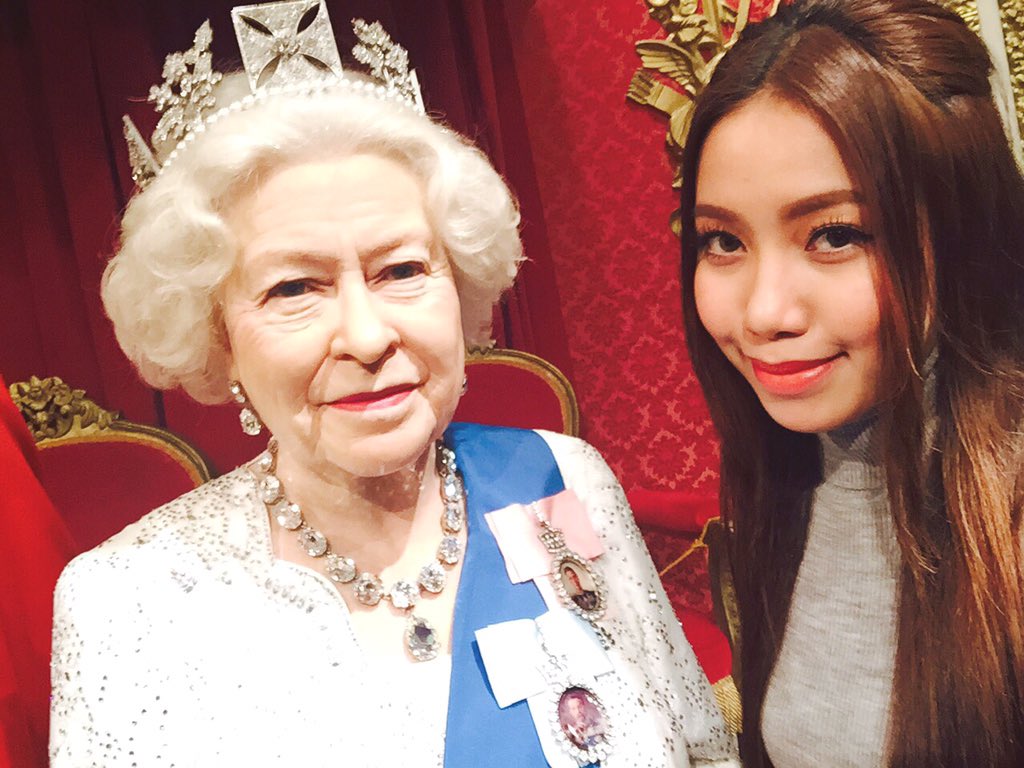 4sisters_celina's tweet photo. Here's my selfie with her Majesty the Queen Elizabeth II 👑 I thought it was REAL! 😍 Live life to the fullest. 😘 https://t.co/tPWtr7XS4d
