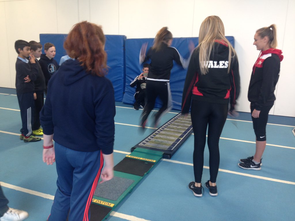 Pupils from <a href="/NPTCGroup/">Grŵp Colegau NPTC Group of Colleges</a> teaching long jump👏🏻