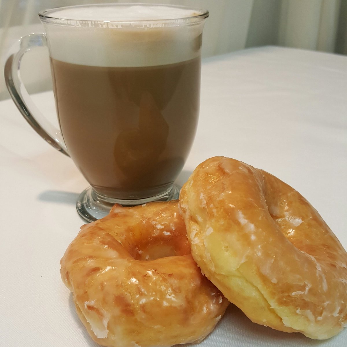 Come warm up with our new hot S'mores Latte! It goes great with our delicious glazed donuts.