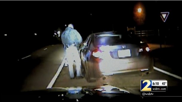 wsbtv's tweet photo. “I don’t care about your people,” cop says to African American driver. https://t.co/grfBwljeSq https://t.co/slPpmO9tb6