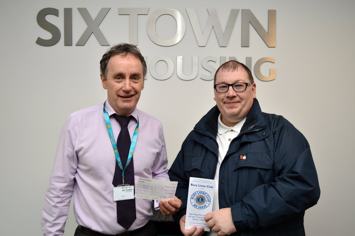 IPP Scott Richardson MJF, presents Burys Six Town Housing, John Merrick £500 to help local victims of flooding.