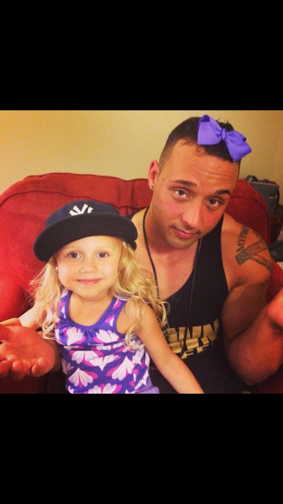 TheDaylan's tweet photo. #TBT to my beautiful God Daughter a few years ago making me wear her purple hair bow and of course I couldn't say no https://t.co/pHGpOhHXVo