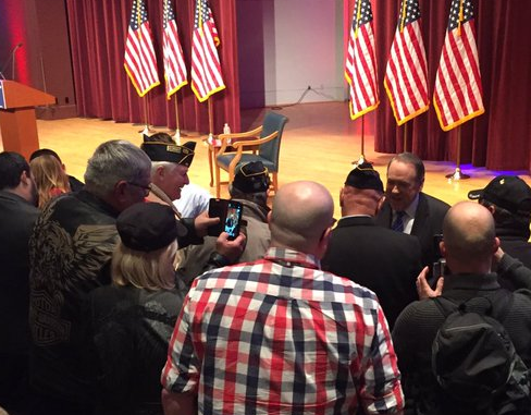 .@GovMikeHuckabee talking with #vets at the #veterans rally following the #gopdebate #ImWithHuck