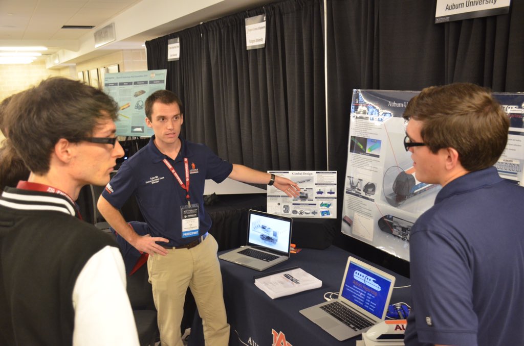 auhyperloop's tweet image. Tyler Nix and Michael Bolt show off Auburn's Hyperloop design at Texas A&M Design weekend @AuburnEngineers