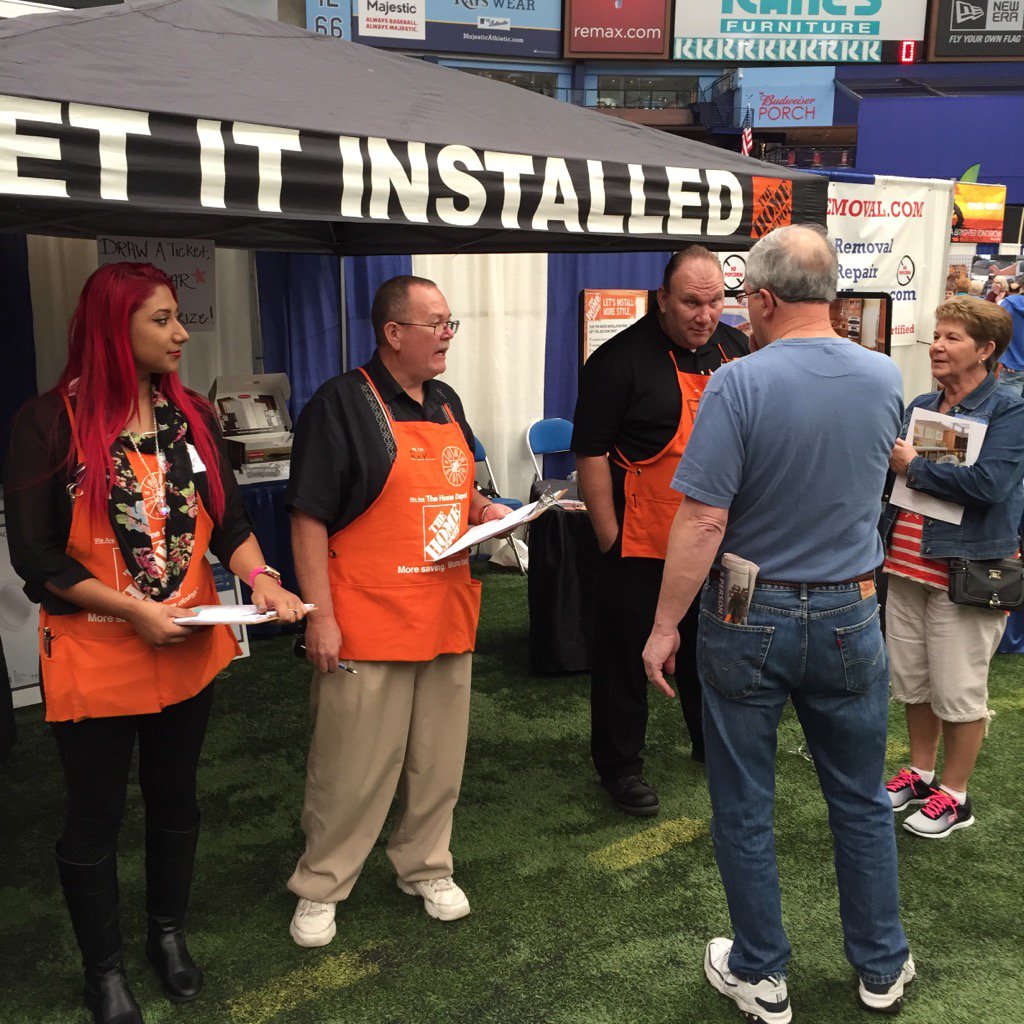 Store associates from 6357 and 289 sharing INSTALL options at the St. Pete Home Show...Great Job ORANGE Team!