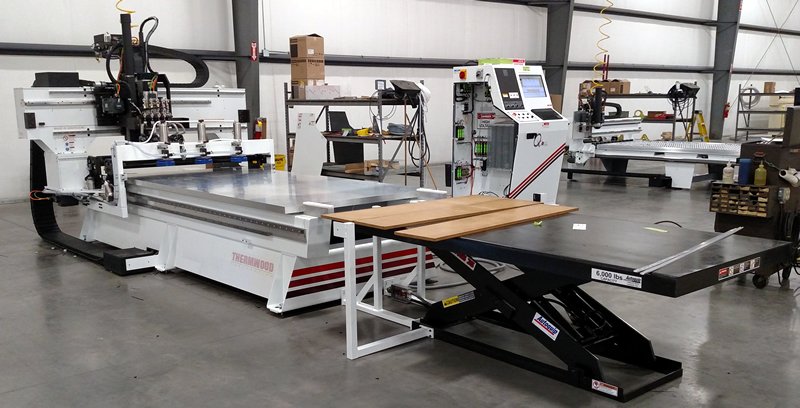 thermwood's tweet photo. #Thermwood #3Axis FB53 5'x10' #CNC w/roller hold down, auto at-the-head tool changer & auto load #upholsteredframes https://t.co/jZxxPbAmfl