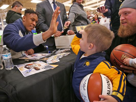 indystar's tweet image. "If I ever made it, I'd try to make (serving the less fortunate) a big deal." At 19, he is. indy.st/1SOZP7u