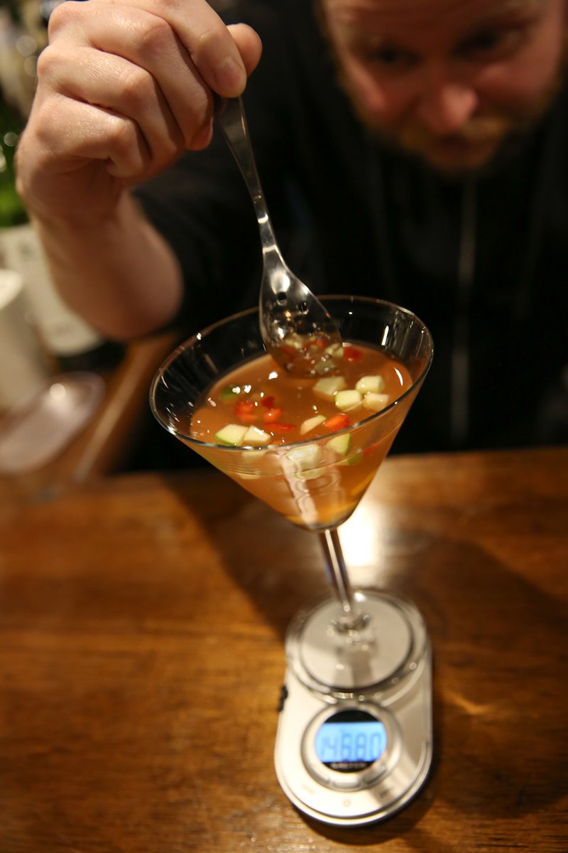 doorbelow's tweet image. cocktail of the day - Still Life // White sangria with suspended fruit pieces and mint within it.