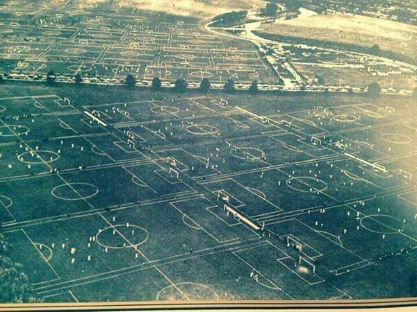 Hackney Marshes, London, 1951. 88 football pitches all in the same place.

The Home of Sunday League football.