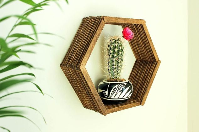Hometalk's tweet photo. Absolutely phenomenal #DIY popsicle wall art and shelf via @MakeAndDoCrew #homedecor   https://t.co/ix7PNH3WIg https://t.co/QUfFv41NdY