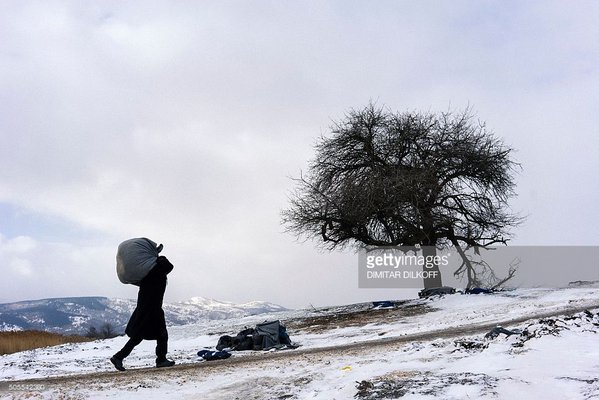 IMGimages's tweet photo. RT GettyImagesNews: A migrant walks across a snow-covered field in Serbia #migrantcrisis AFP https://t.co/zbWQZHFoYK