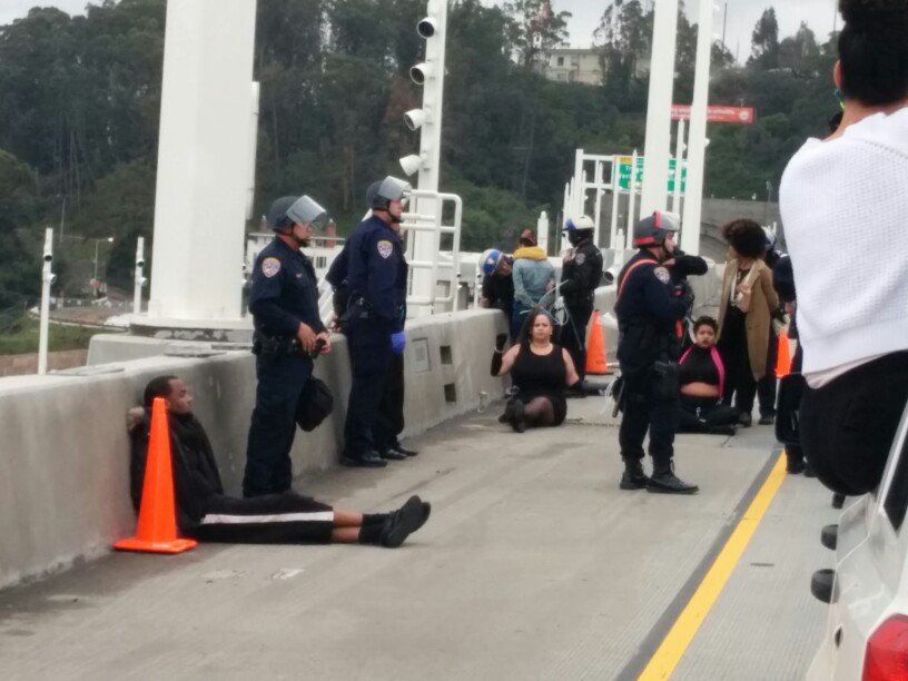 BaySolidarity's tweet photo. Blockaders being cut out on #BAYBRIDGE. Arrests in progress https://t.co/JrHxTzXzfc