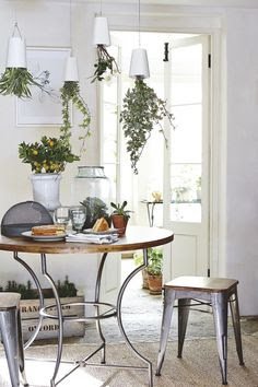 trumatter's tweet image. @discernliving @ZeniaIrani @abhikbee sharing a favorite, a dining with upside down herb pots. #DiscernLiving