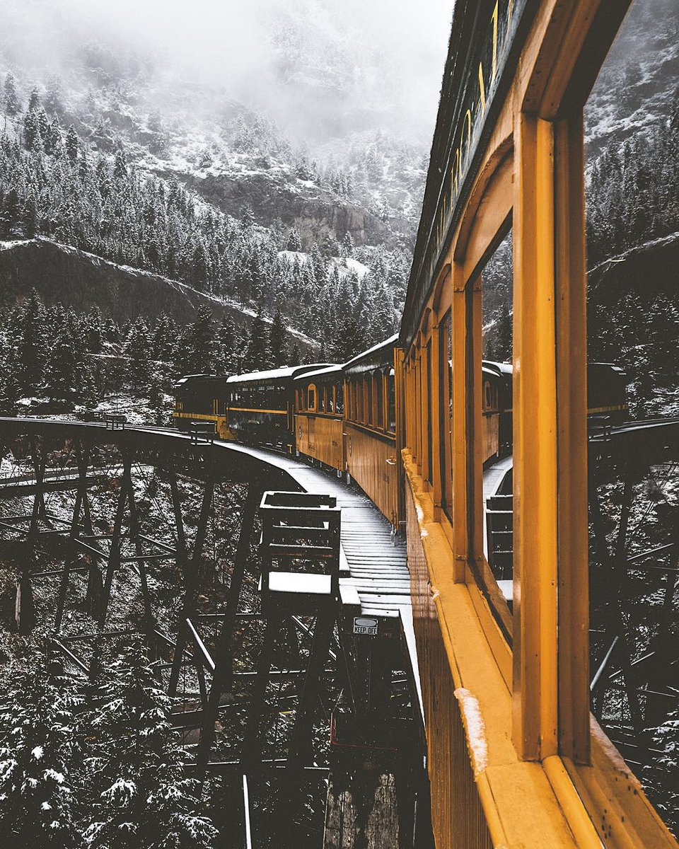 A snowy train in Colorado | Photo by jude_allen (IG)