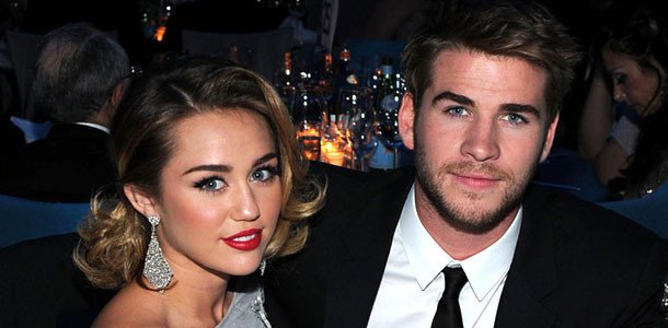 enews's tweet photo. History repeating itself? Miley Cyrus is wearing her engagement ring from Liam Hemsworth: https://t.co/lwrza85d84 https://t.co/DCPv03nUGc
